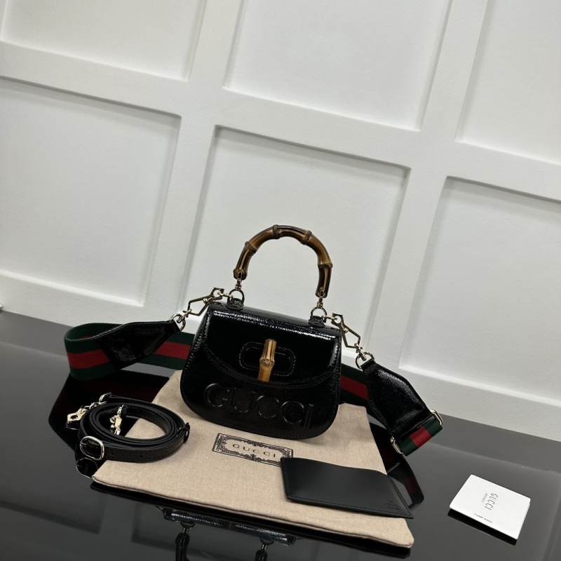 G*u*i top handle bags